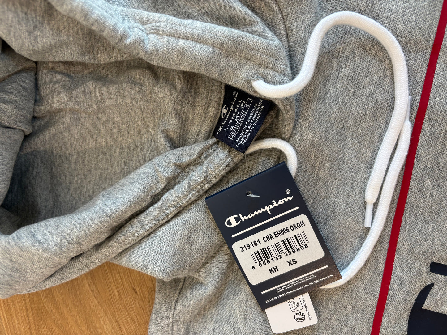 Champion - Kaputzenhoody Grau - Frontprint Rot Blau - XS